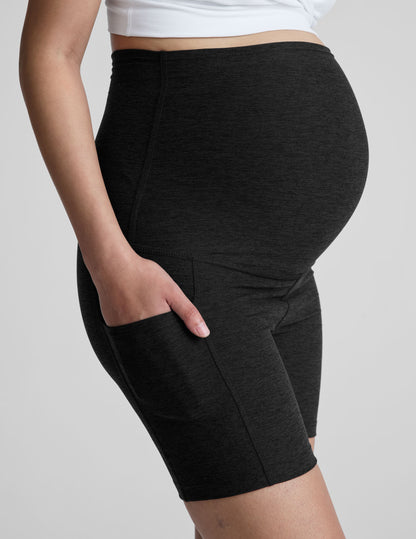 Black marled Spacedye Keep Pace 5" Maternity Pocket Biker Short with high over-the-bump waistband and side pocket.