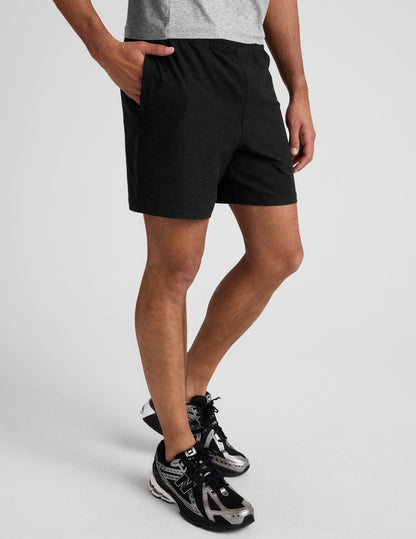 Black marled Spacedye Unlimited Men's Short featuring a relaxed fit, elastic waistband, and side zippered hand pockets.