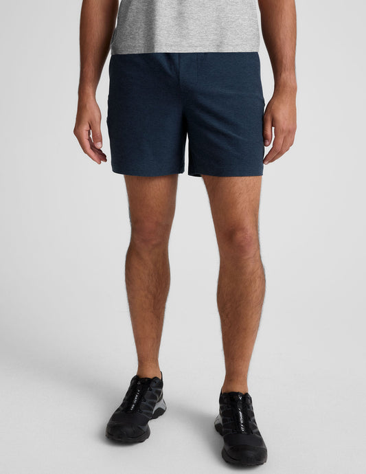 Front view of navy Spacedye Unlimited Men's Short featuring a gathered elastic waistband and relaxed mid-thigh fit.
