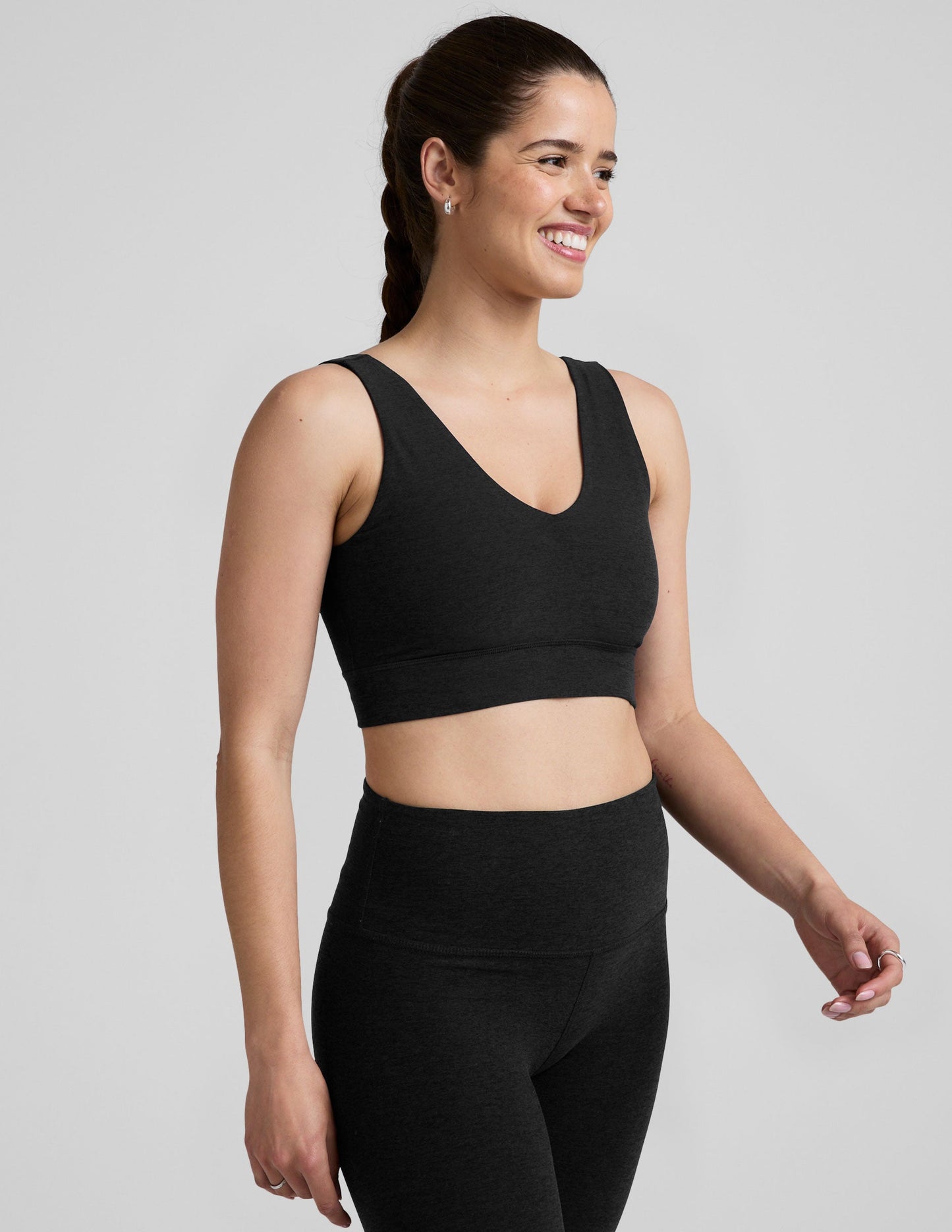 black long line style bra with a front and back v-neck.