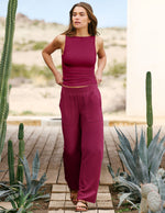 Woman wearing Maroon Easy Wide Leg Pant 31™ paired with a matching tank top and brown sandals.