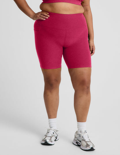 Woman wearing Pink Spacedye™ Keep Pace 7" Pocket Short paired with white socks and silver sneakers.